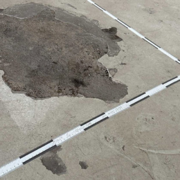 Vermessung von Spuren auf Böden.